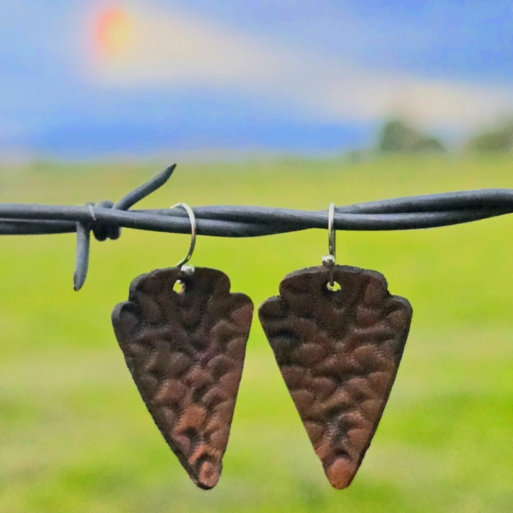 Full grain leather arrowhead earrings